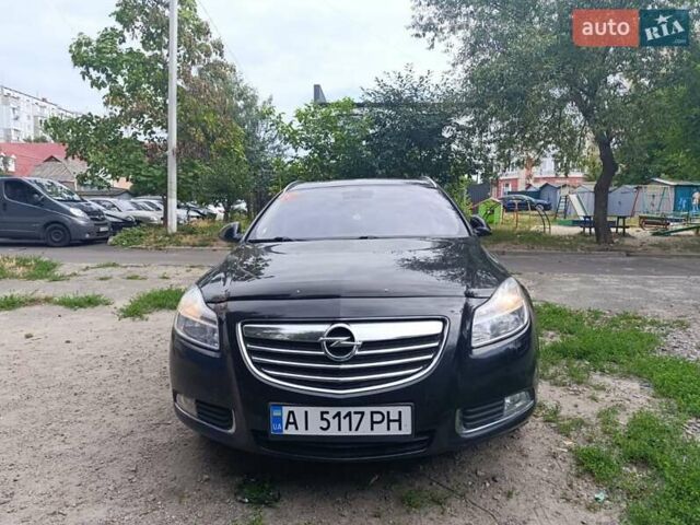 Черный Опель Инсигния, объемом двигателя 1.96 л и пробегом 236 тыс. км за 7500 $, фото 1 на Automoto.ua