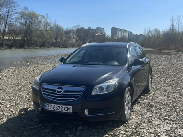 Чорний Опель Інсігнія, об'ємом двигуна 2 л та пробігом 197 тис. км за 8500 $, фото 1 на Automoto.ua