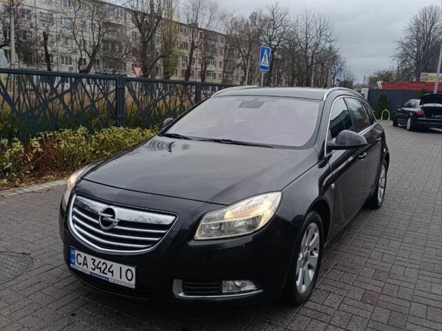 Чорний Опель Інсігнія, об'ємом двигуна 2 л та пробігом 175 тис. км за 6700 $, фото 1 на Automoto.ua