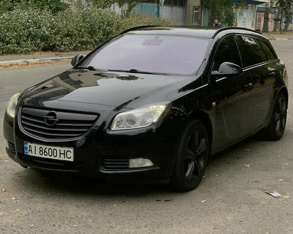 Черный Опель Инсигния, объемом двигателя 1.96 л и пробегом 279 тыс. км за 9800 $, фото 1 на Automoto.ua