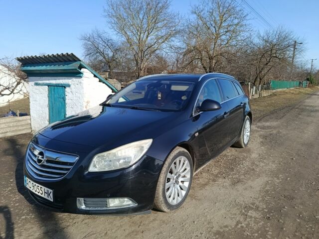 Чорний Опель Інсігнія, об'ємом двигуна 2 л та пробігом 248 тис. км за 7700 $, фото 1 на Automoto.ua
