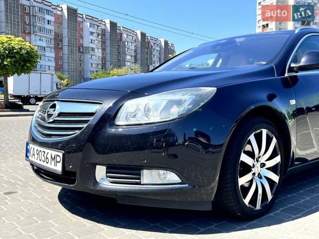 Черный Опель Инсигния, объемом двигателя 1.96 л и пробегом 290 тыс. км за 7000 $, фото 1 на Automoto.ua