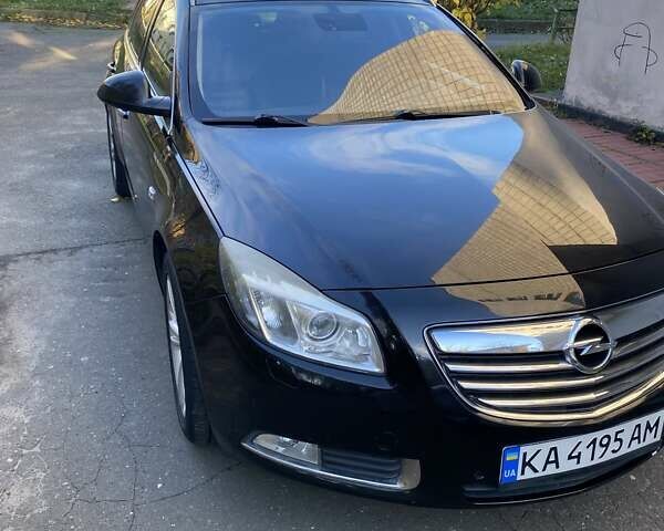 Черный Опель Инсигния, объемом двигателя 1.96 л и пробегом 208 тыс. км за 7750 $, фото 1 на Automoto.ua