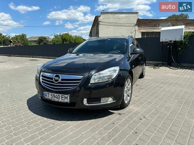Черный Опель Инсигния, объемом двигателя 2 л и пробегом 240 тыс. км за 6750 $, фото 1 на Automoto.ua