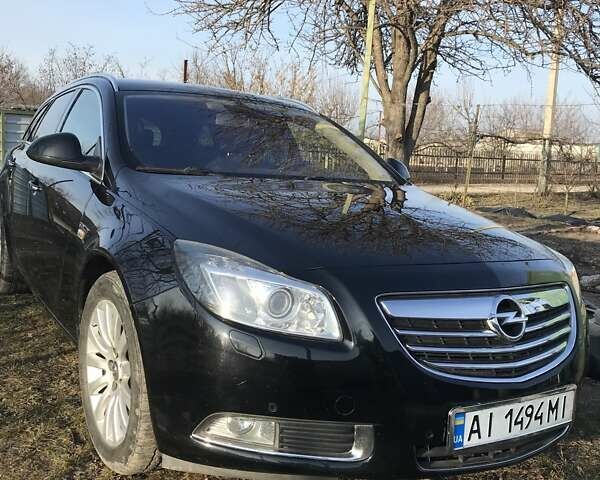 Черный Опель Инсигния, объемом двигателя 2.03 л и пробегом 200 тыс. км за 8200 $, фото 1 на Automoto.ua
