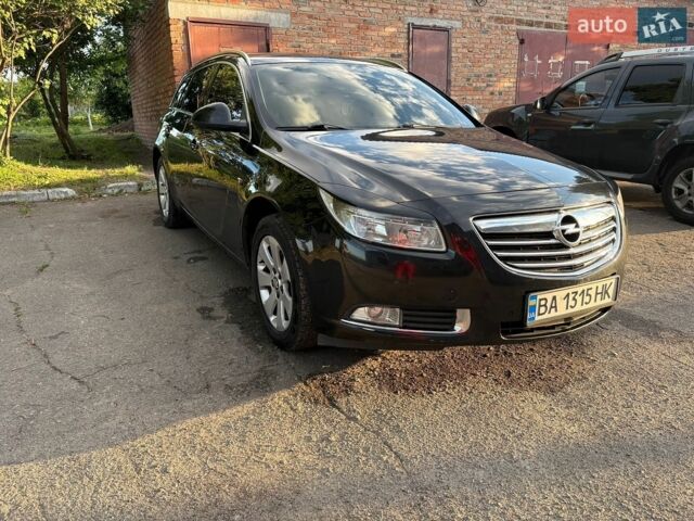 Черный Опель Инсигния, объемом двигателя 2 л и пробегом 324 тыс. км за 7200 $, фото 1 на Automoto.ua
