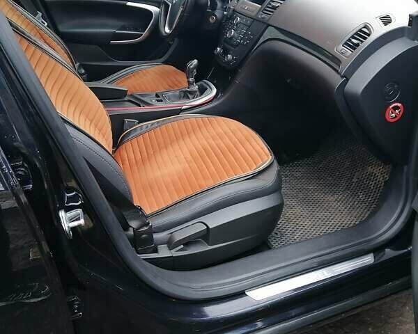 Черный Опель Инсигния, объемом двигателя 1.96 л и пробегом 248 тыс. км за 7800 $, фото 1 на Automoto.ua