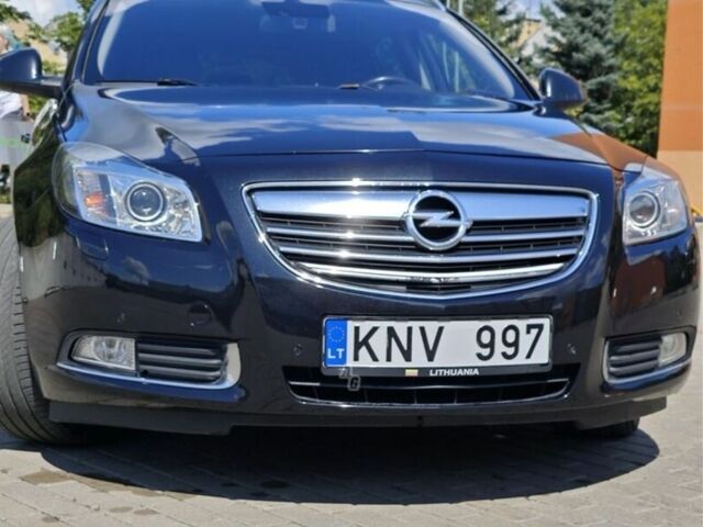 Чорний Опель Інсігнія, об'ємом двигуна 2 л та пробігом 320 тис. км за 6000 $, фото 1 на Automoto.ua