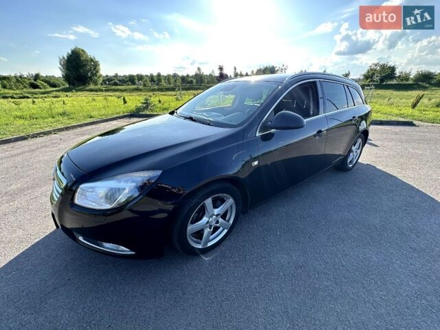 Черный Опель Инсигния, объемом двигателя 2 л и пробегом 195 тыс. км за 7700 $, фото 1 на Automoto.ua