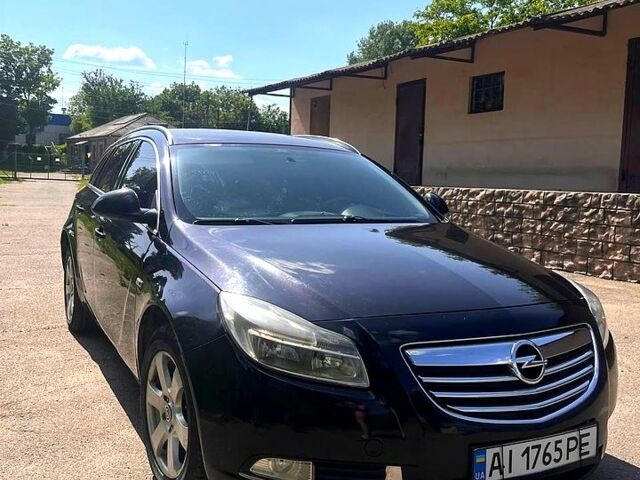 Черный Опель Инсигния, объемом двигателя 2 л и пробегом 259 тыс. км за 6200 $, фото 1 на Automoto.ua