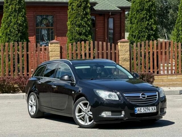 Черный Опель Инсигния, объемом двигателя 2 л и пробегом 290 тыс. км за 7900 $, фото 1 на Automoto.ua