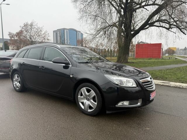 Черный Опель Инсигния, объемом двигателя 1.6 л и пробегом 204 тыс. км за 8000 $, фото 1 на Automoto.ua