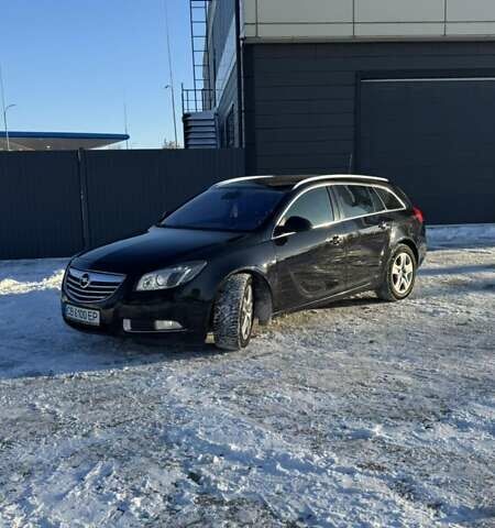 Чорний Опель Інсігнія, об'ємом двигуна 2 л та пробігом 299 тис. км за 6350 $, фото 1 на Automoto.ua