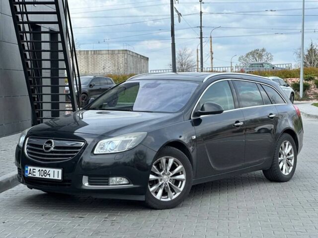 Черный Опель Инсигния, объемом двигателя 2 л и пробегом 160 тыс. км за 6300 $, фото 1 на Automoto.ua