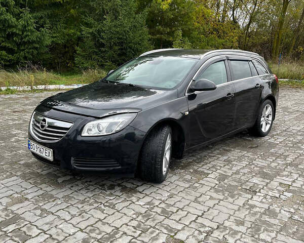 Черный Опель Инсигния, объемом двигателя 1.96 л и пробегом 210 тыс. км за 7200 $, фото 1 на Automoto.ua