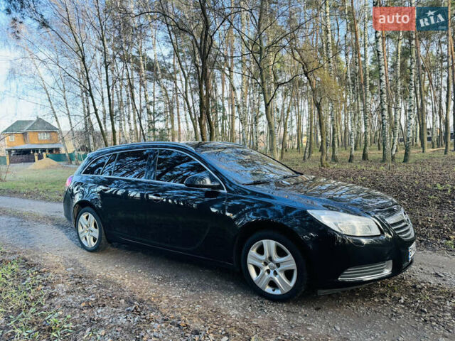 Черный Опель Инсигния, объемом двигателя 2 л и пробегом 97 тыс. км за 8800 $, фото 1 на Automoto.ua