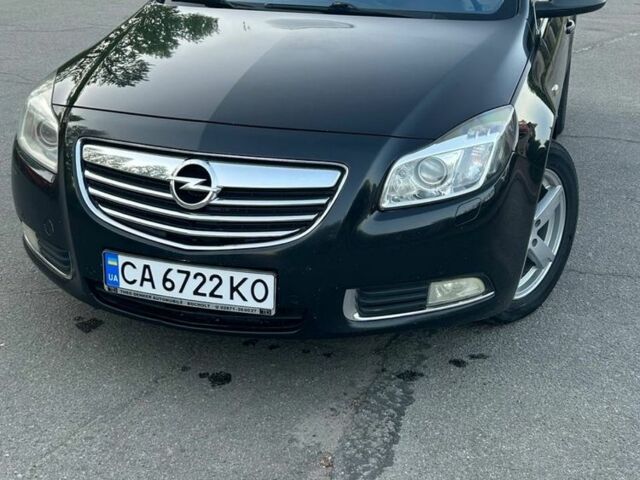Черный Опель Инсигния, объемом двигателя 2 л и пробегом 395 тыс. км за 6800 $, фото 1 на Automoto.ua