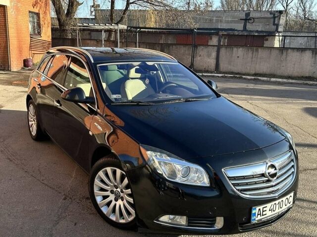 Чорний Опель Інсігнія, об'ємом двигуна 2 л та пробігом 285 тис. км за 6500 $, фото 1 на Automoto.ua
