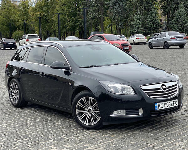 Черный Опель Инсигния, объемом двигателя 2 л и пробегом 238 тыс. км за 9400 $, фото 1 на Automoto.ua