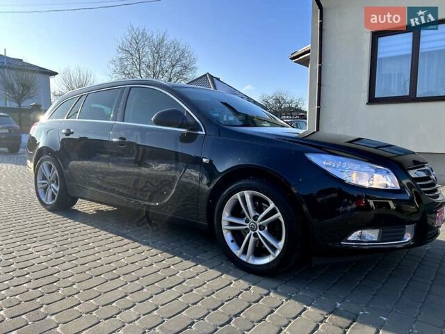 Черный Опель Инсигния, объемом двигателя 1.6 л и пробегом 200 тыс. км за 7999 $, фото 1 на Automoto.ua