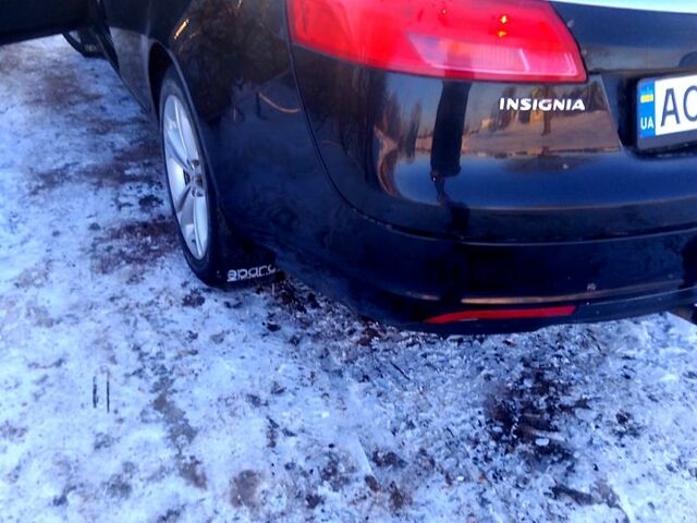 Черный Опель Инсигния, объемом двигателя 2 л и пробегом 23400 тыс. км за 5950 $, фото 1 на Automoto.ua