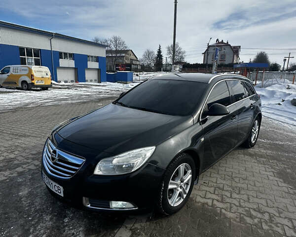 Чорний Опель Інсігнія, об'ємом двигуна 1.96 л та пробігом 220 тис. км за 6450 $, фото 1 на Automoto.ua