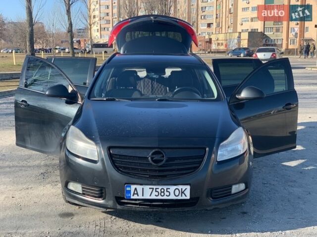 Чорний Опель Інсігнія, об'ємом двигуна 1.96 л та пробігом 410 тис. км за 7100 $, фото 1 на Automoto.ua
