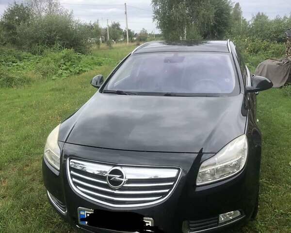 Черный Опель Инсигния, объемом двигателя 2 л и пробегом 240 тыс. км за 8100 $, фото 1 на Automoto.ua