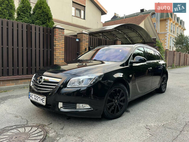 Черный Опель Инсигния, объемом двигателя 2 л и пробегом 307 тыс. км за 8500 $, фото 1 на Automoto.ua