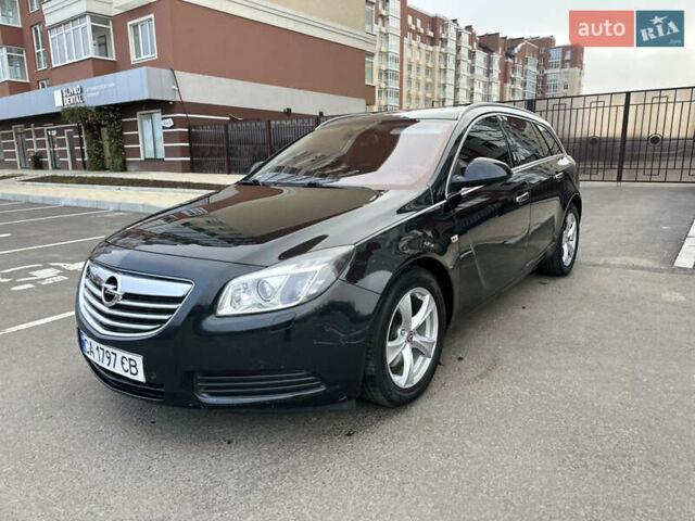 Черный Опель Инсигния, объемом двигателя 2 л и пробегом 194 тыс. км за 7500 $, фото 1 на Automoto.ua