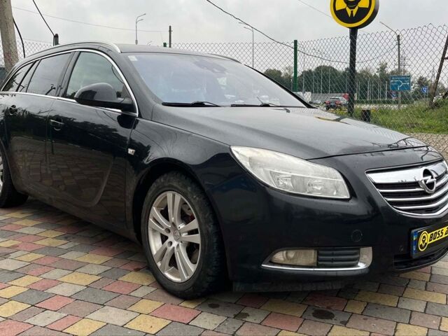 Черный Опель Инсигния, объемом двигателя 2 л и пробегом 237 тыс. км за 6700 $, фото 1 на Automoto.ua