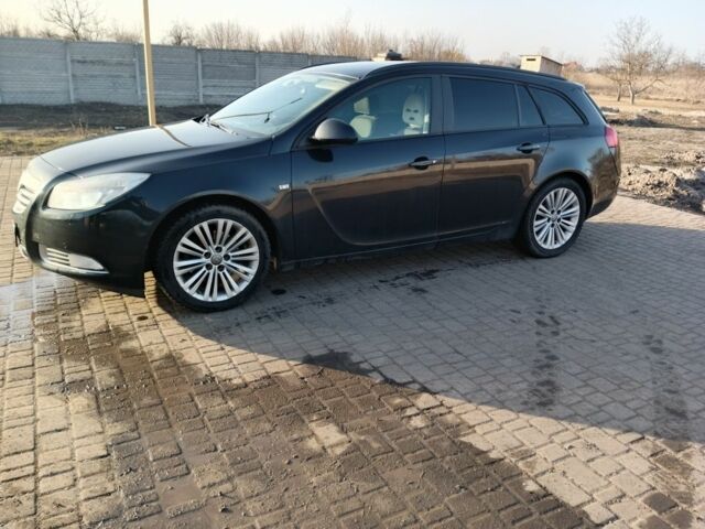 Черный Опель Инсигния, объемом двигателя 2 л и пробегом 239 тыс. км за 4899 $, фото 1 на Automoto.ua