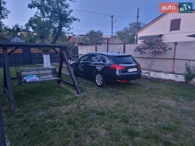 Черный Опель Инсигния, объемом двигателя 1.96 л и пробегом 300 тыс. км за 9200 $, фото 1 на Automoto.ua
