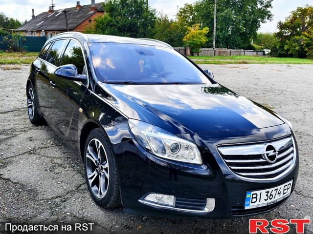 Чорний Опель Інсігнія, об'ємом двигуна 2 л та пробігом 243 тис. км за 8000 $, фото 1 на Automoto.ua