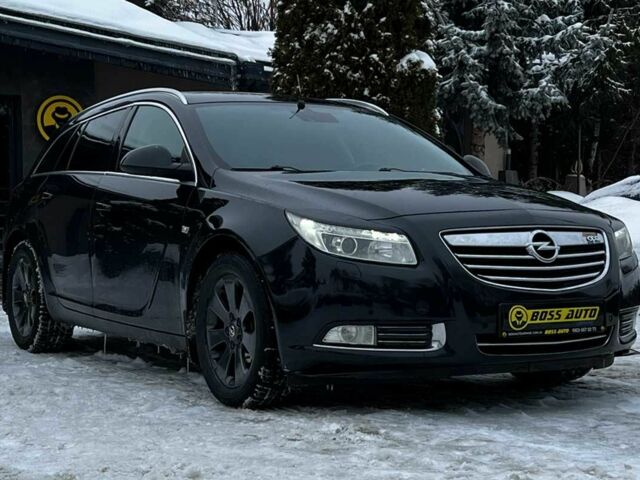 Чорний Опель Інсігнія, об'ємом двигуна 2 л та пробігом 231 тис. км за 8999 $, фото 1 на Automoto.ua