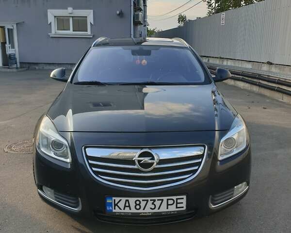 Черный Опель Инсигния, объемом двигателя 1.96 л и пробегом 315 тыс. км за 9000 $, фото 1 на Automoto.ua