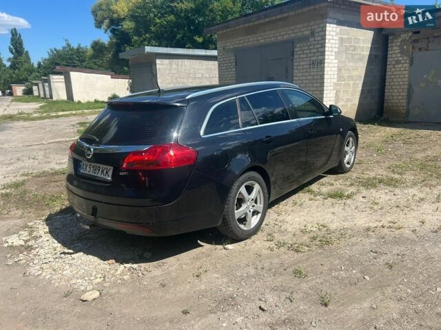Чорний Опель Інсігнія, об'ємом двигуна 1.96 л та пробігом 270 тис. км за 7000 $, фото 1 на Automoto.ua