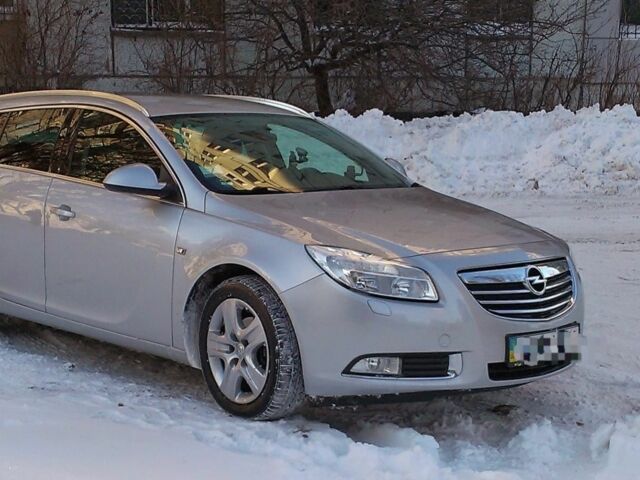 Черный Опель Инсигния, объемом двигателя 1.6 л и пробегом 256 тыс. км за 8000 $, фото 1 на Automoto.ua