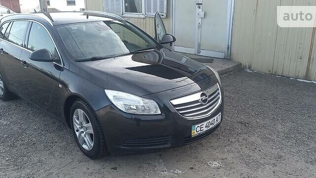 Черный Опель Инсигния, объемом двигателя 2 л и пробегом 400 тыс. км за 7500 $, фото 1 на Automoto.ua