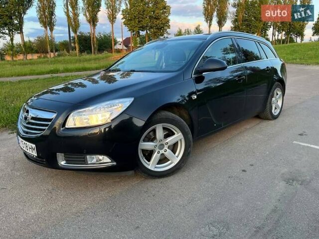 Черный Опель Инсигния, объемом двигателя 2 л и пробегом 238 тыс. км за 8050 $, фото 1 на Automoto.ua