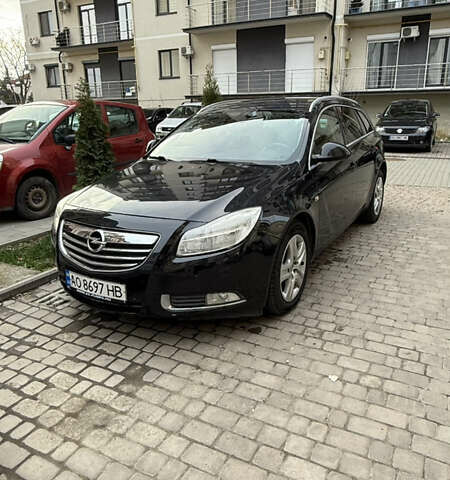 Черный Опель Инсигния, объемом двигателя 2 л и пробегом 305 тыс. км за 7000 $, фото 1 на Automoto.ua