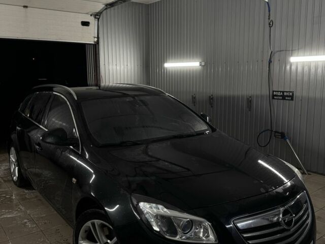 Черный Опель Инсигния, объемом двигателя 2 л и пробегом 280 тыс. км за 5700 $, фото 1 на Automoto.ua