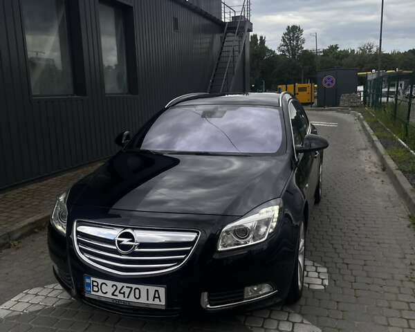 Черный Опель Инсигния, объемом двигателя 1.96 л и пробегом 300 тыс. км за 10400 $, фото 1 на Automoto.ua