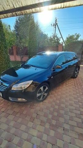 Чорний Опель Інсігнія, об'ємом двигуна 1.96 л та пробігом 275 тис. км за 7500 $, фото 1 на Automoto.ua