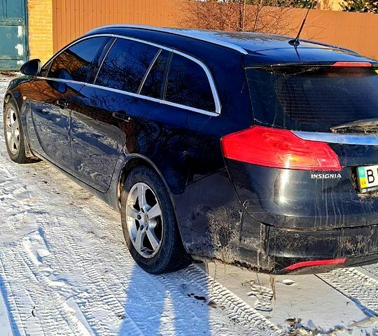 Черный Опель Инсигния, объемом двигателя 1.8 л и пробегом 24000 тыс. км за 6500 $, фото 1 на Automoto.ua