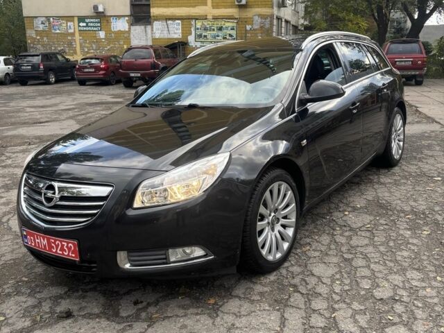 Чорний Опель Інсігнія, об'ємом двигуна 2 л та пробігом 333 тис. км за 10150 $, фото 1 на Automoto.ua