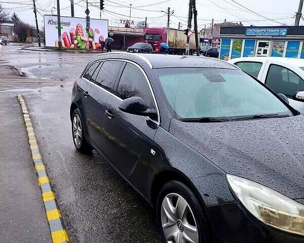 Чорний Опель Інсігнія, об'ємом двигуна 2 л та пробігом 250 тис. км за 7999 $, фото 1 на Automoto.ua