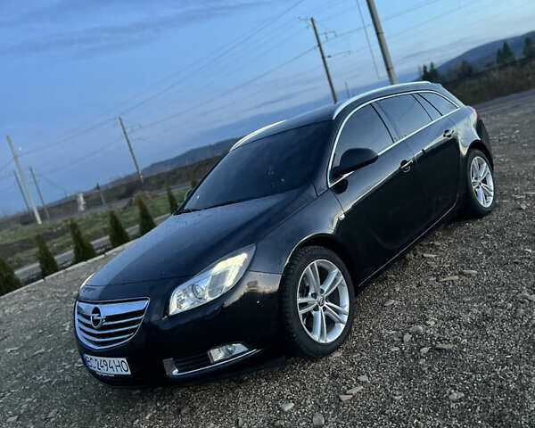 Чорний Опель Інсігнія, об'ємом двигуна 1.96 л та пробігом 255 тис. км за 7000 $, фото 1 на Automoto.ua