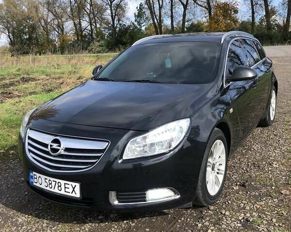 Чорний Опель Інсігнія, об'ємом двигуна 1.96 л та пробігом 370 тис. км за 9000 $, фото 1 на Automoto.ua
