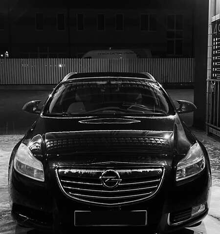 Чорний Опель Інсігнія, об'ємом двигуна 1.96 л та пробігом 256 тис. км за 8175 $, фото 1 на Automoto.ua